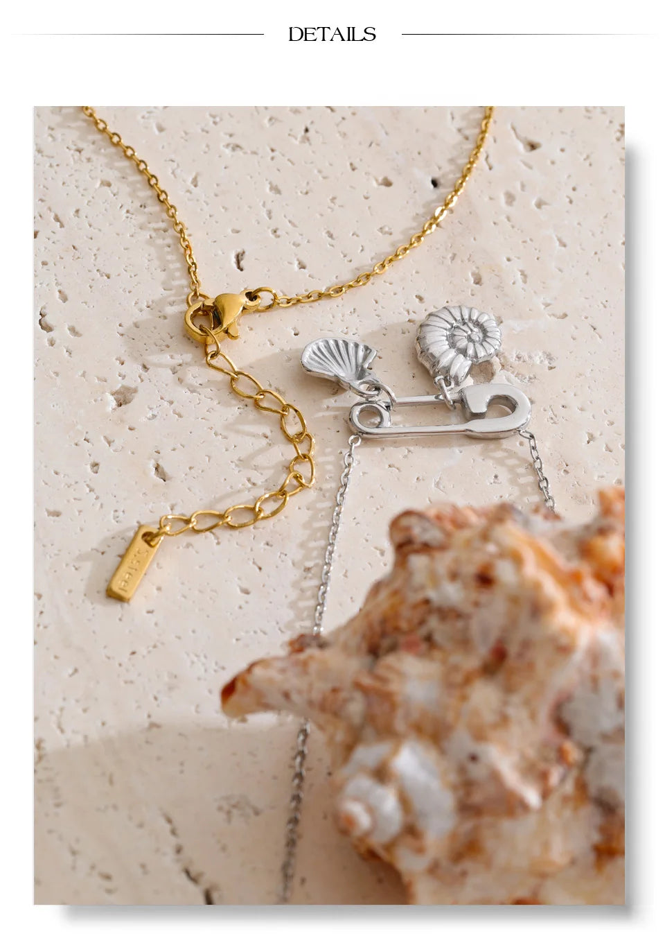 Cubic zirconia shell geometric necklace in gold-plated stainless steel with cubic zirconia and shell.