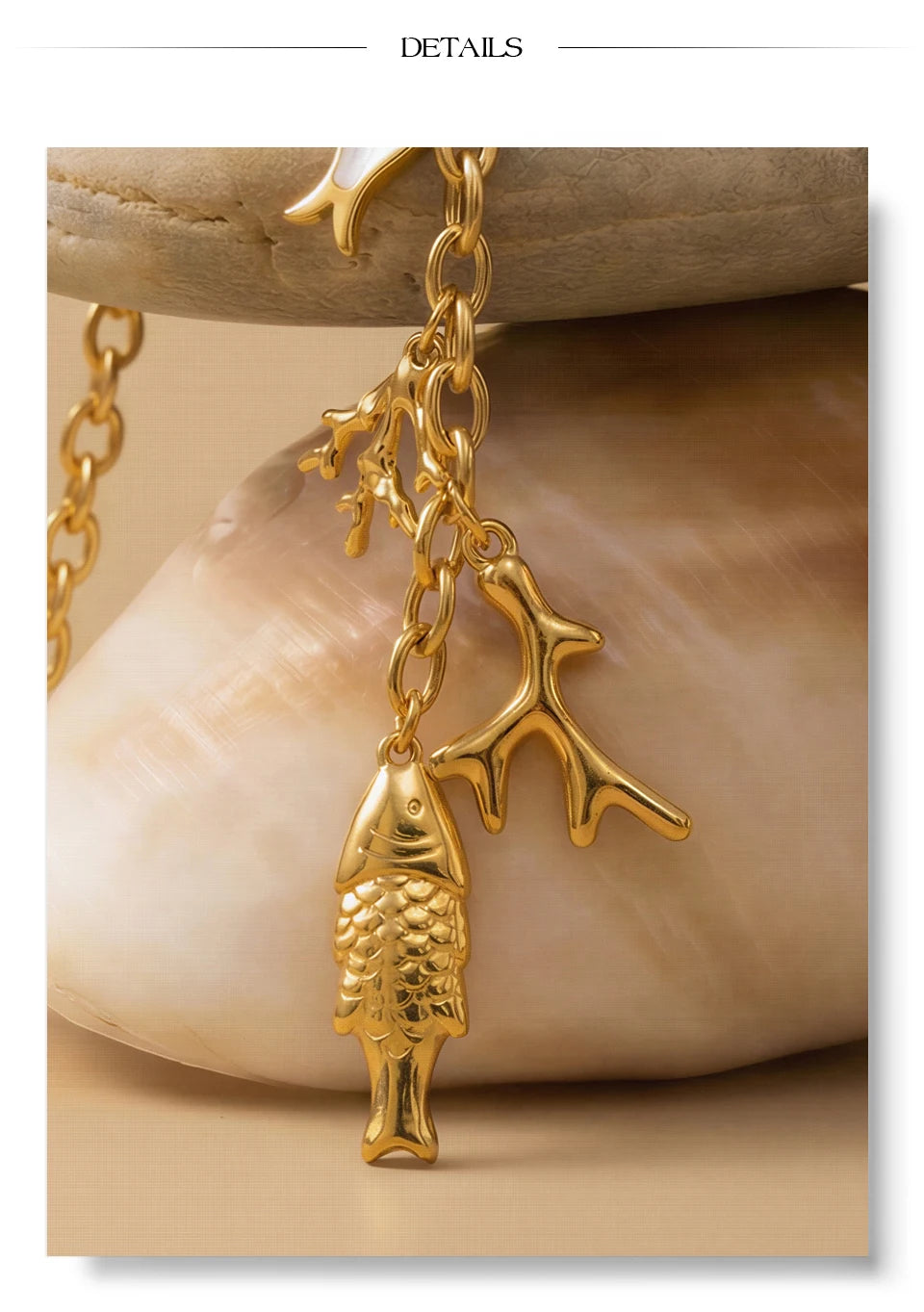 Cubic zirconia shell geometric necklace in gold-plated stainless steel with cubic zirconia and shell.