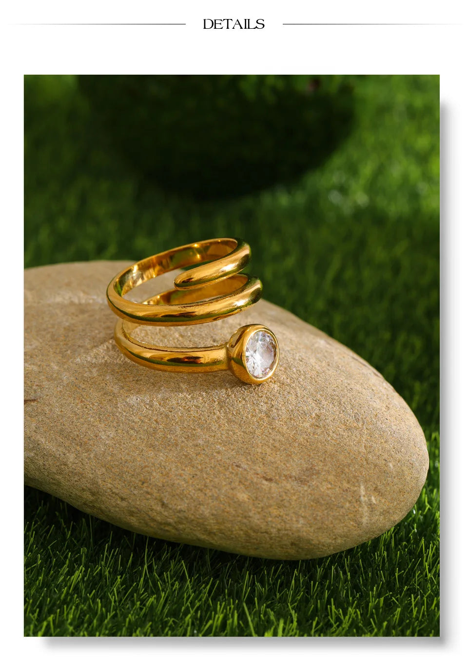 Cubic zirconia geometric layered ring in 18K gold-plated stainless steel with cubic zirconia.