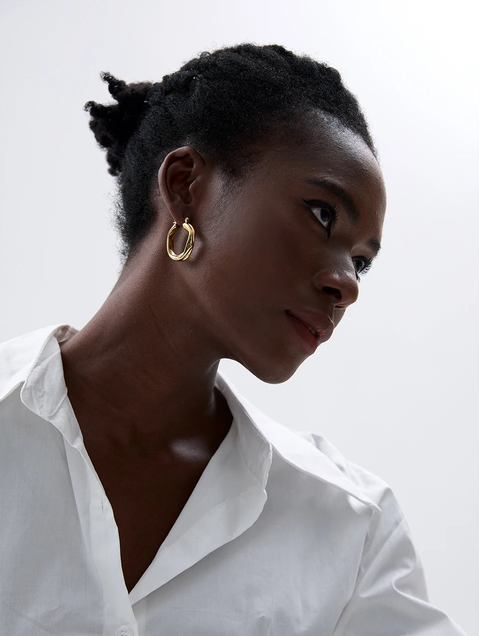 Geometric earrings in gold-plated 316L stainless steel.