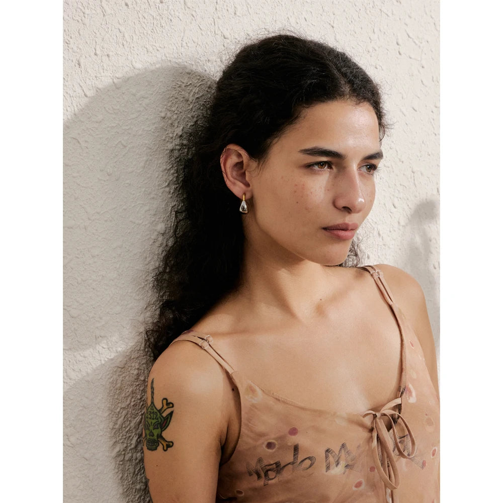 Geometric earrings in gold-plated stainless steel.