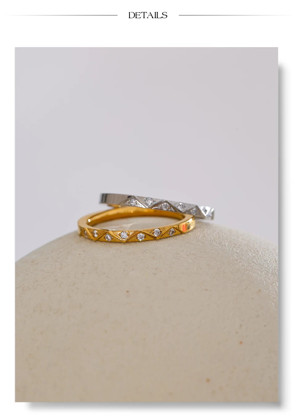 Cubic zirconia geometric ring in gold-plated stainless steel with cubic zirconia.