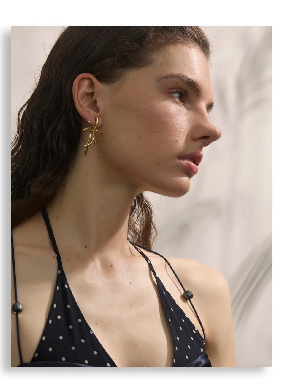 Geometric earrings in gold-plated stainless steel.