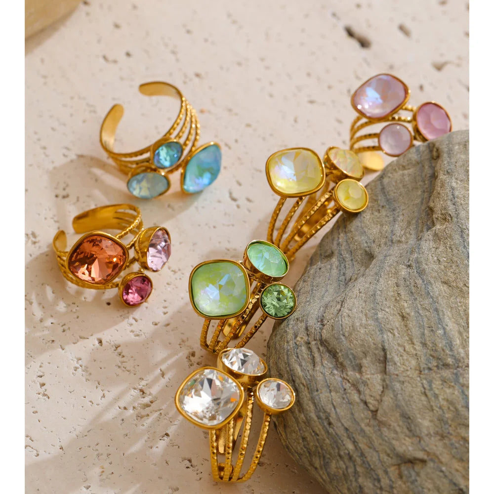 Crystal multi-color geometric ring in 18K gold-plated stainless steel with crystal.