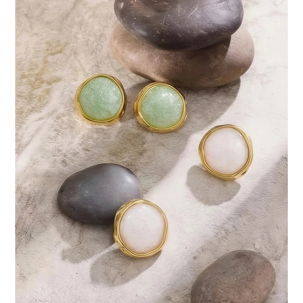 White resin acrylic earrings in gold-plated stainless steel with resin and acrylic.
