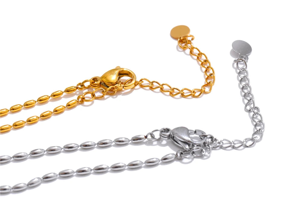 Natural stone geometric necklace in gold-plated stainless steel with natural stone.