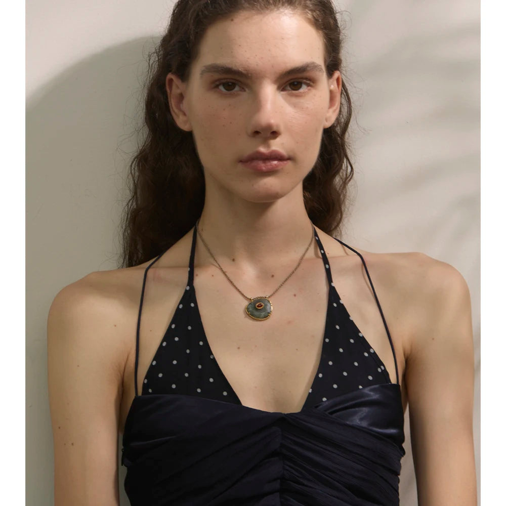Natural stone geometric necklace in gold-plated stainless steel with natural stone.