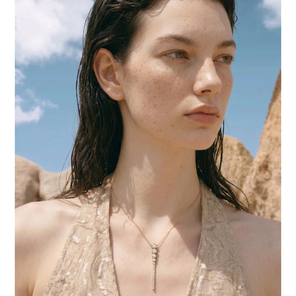 Cubic zirconia geometric necklace in gold-plated stainless steel with cubic zirconia.