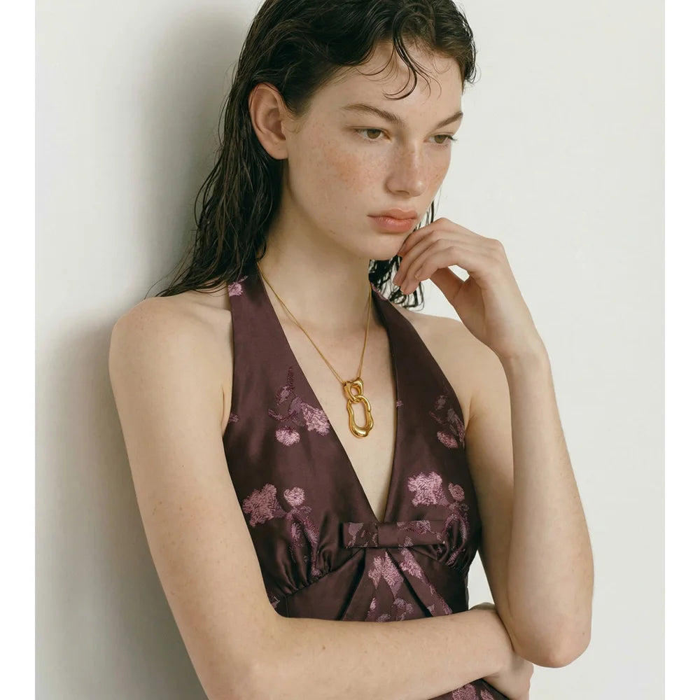 Geometric necklace in gold-plated stainless steel.