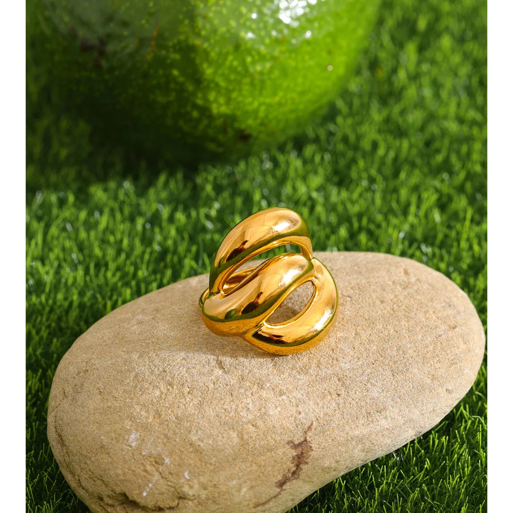 Geometric layered ring in 18K gold-plated stainless steel.