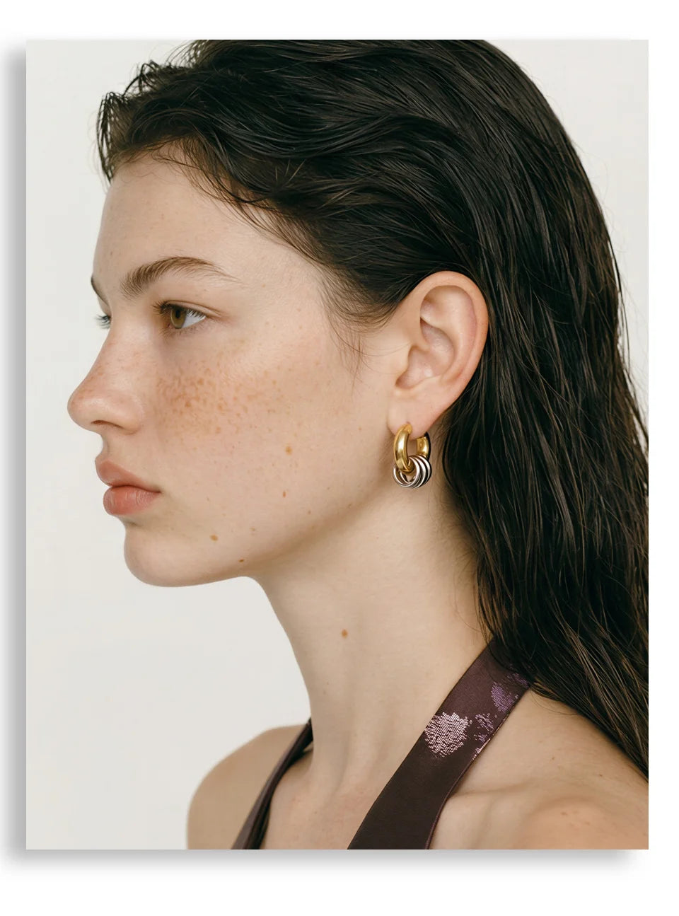 Geometric layered earrings in gold-plated stainless steel.
