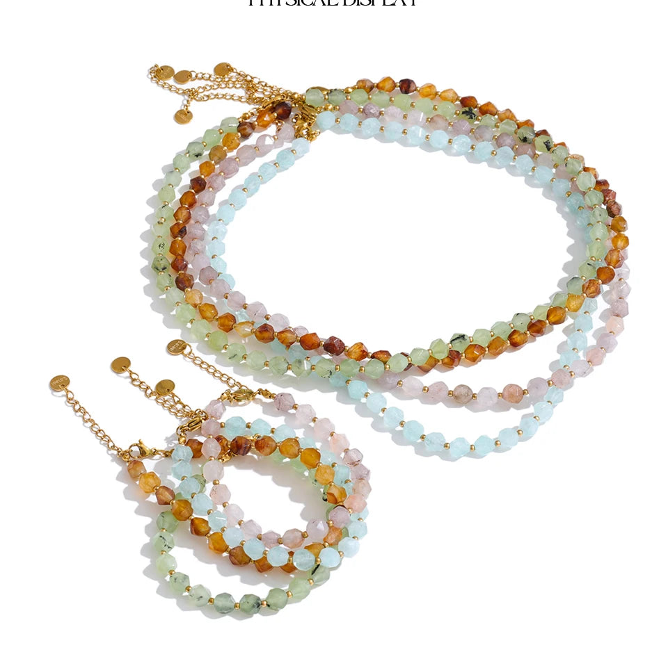 Natural stone beaded multi-color necklace in gold-plated stainless steel with natural stone.