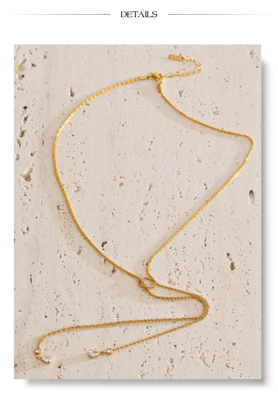 Cubic zirconia geometric chain necklace in gold-plated stainless steel with cubic zirconia.