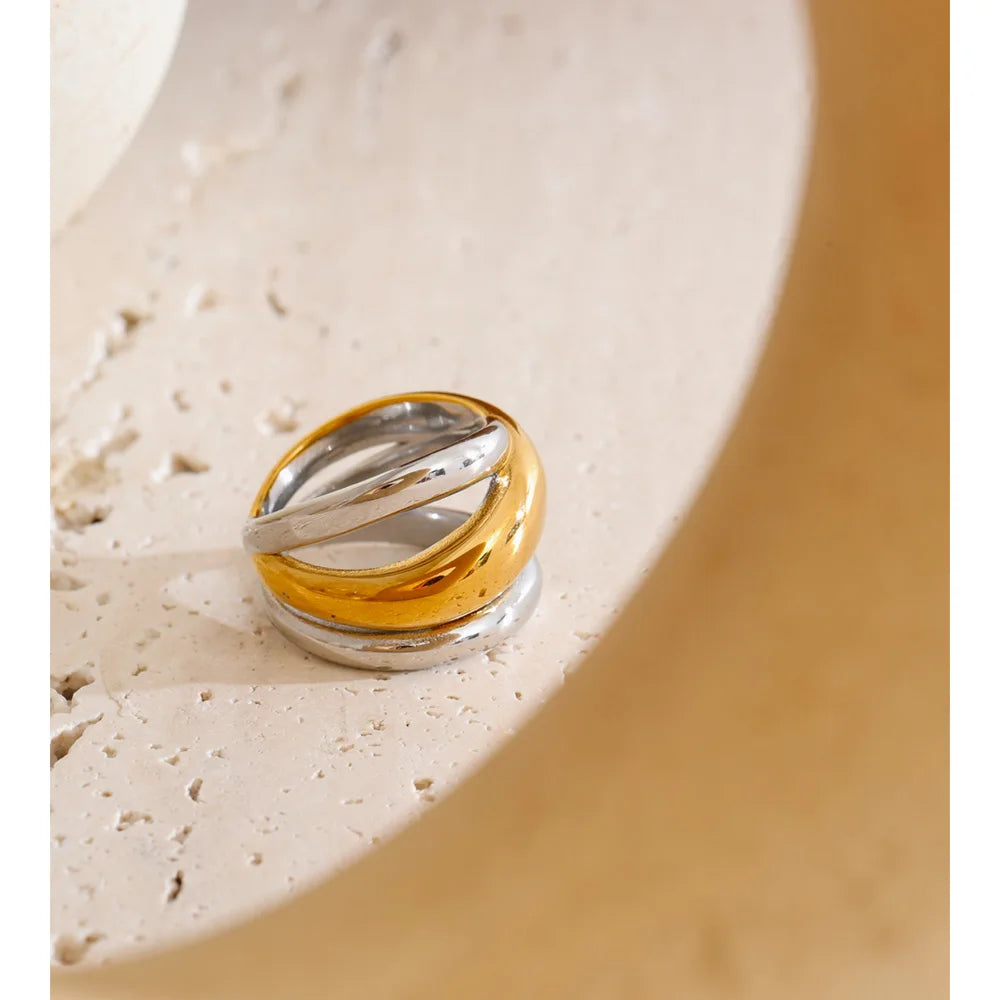 Geometric layered ring in 18K gold-plated stainless steel.