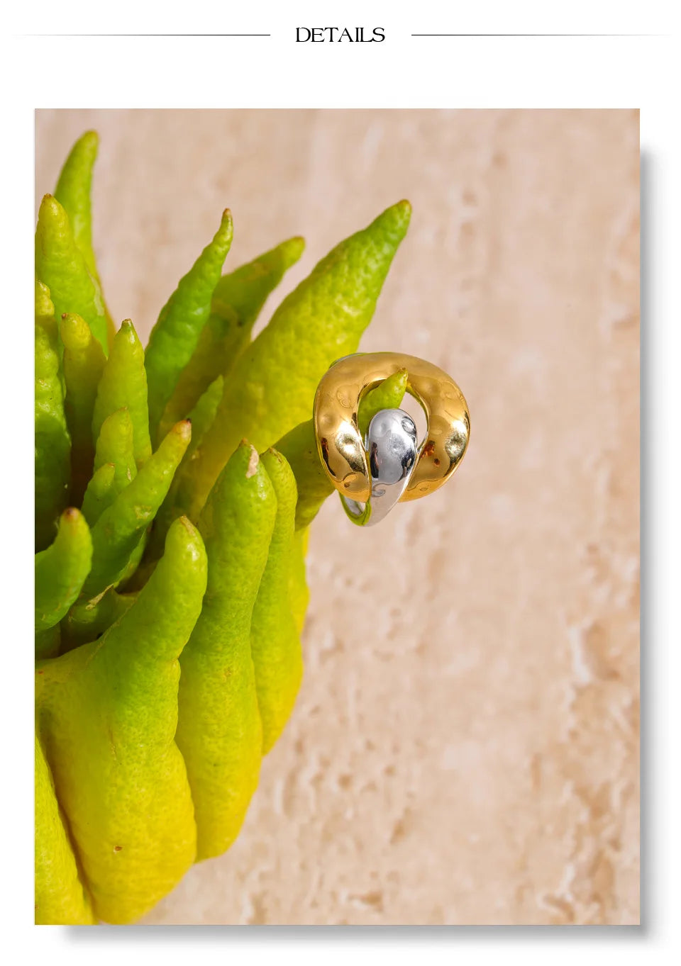 Geometric ring in 18K gold-plated stainless steel.