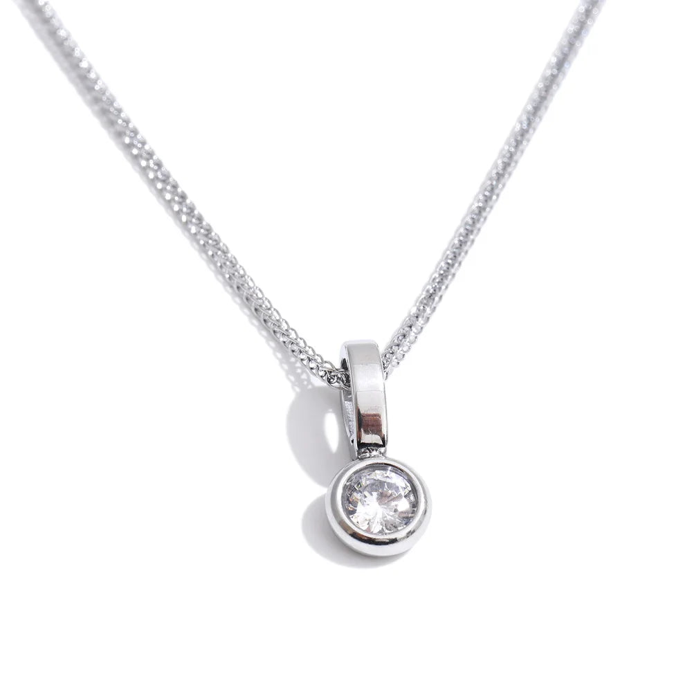 Cubic zirconia geometric necklace in gold-plated stainless steel with cubic zirconia.