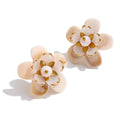 Resin flower earrings in gold-plated stainless steel with resin.