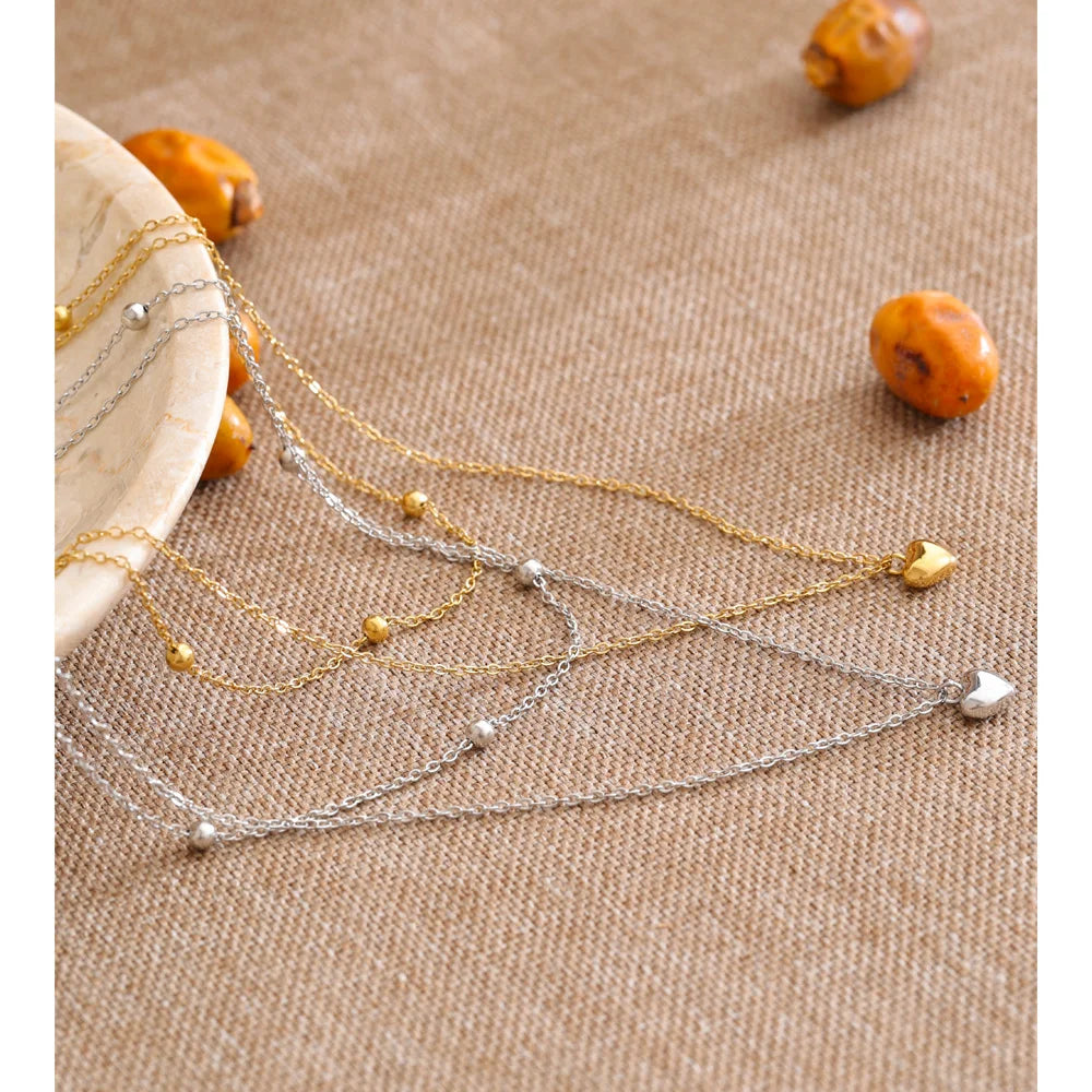 Heart chain necklace in gold-plated stainless steel.