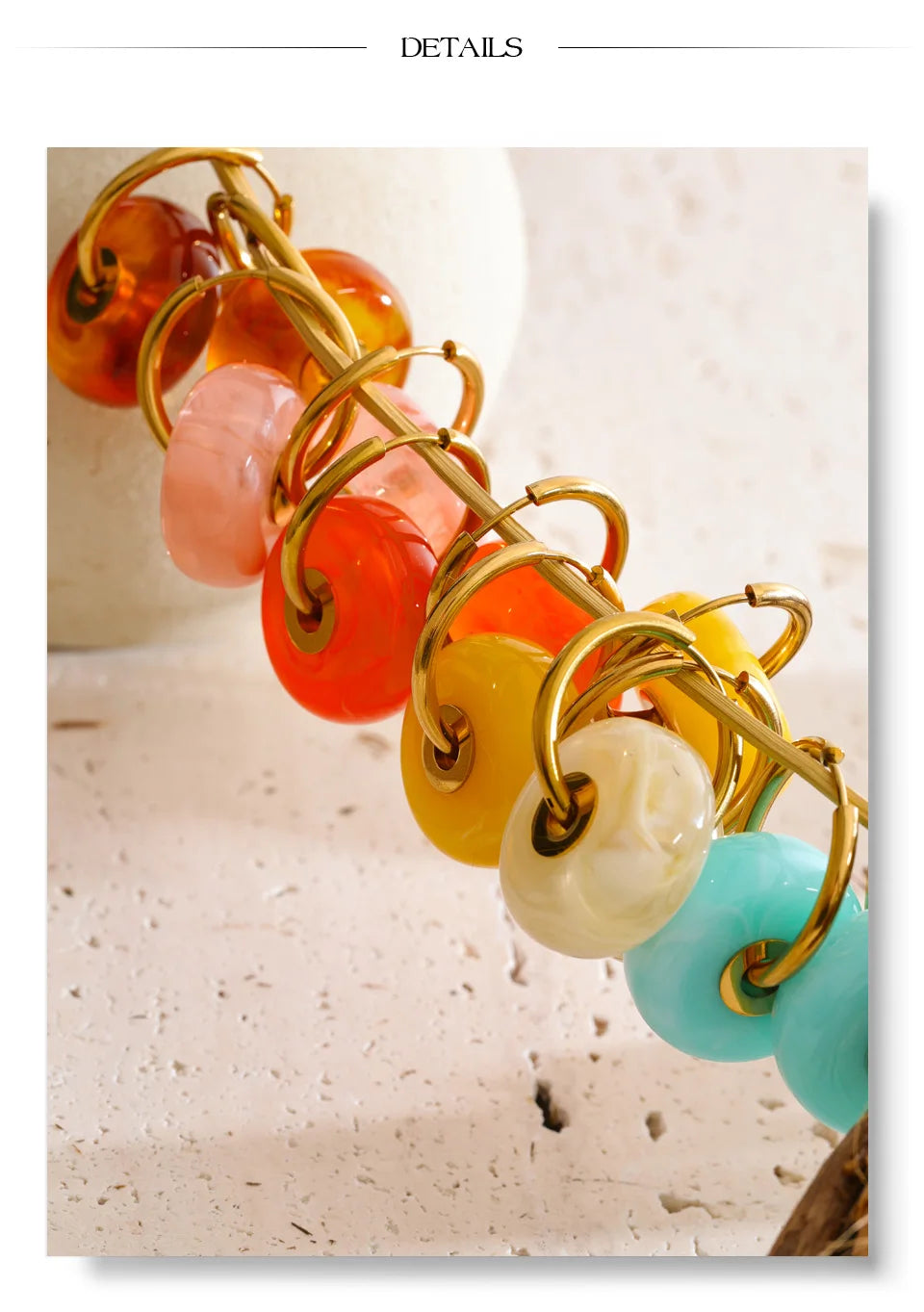 Resin acrylic geometric earrings in gold-plated stainless steel with resin and acrylic.