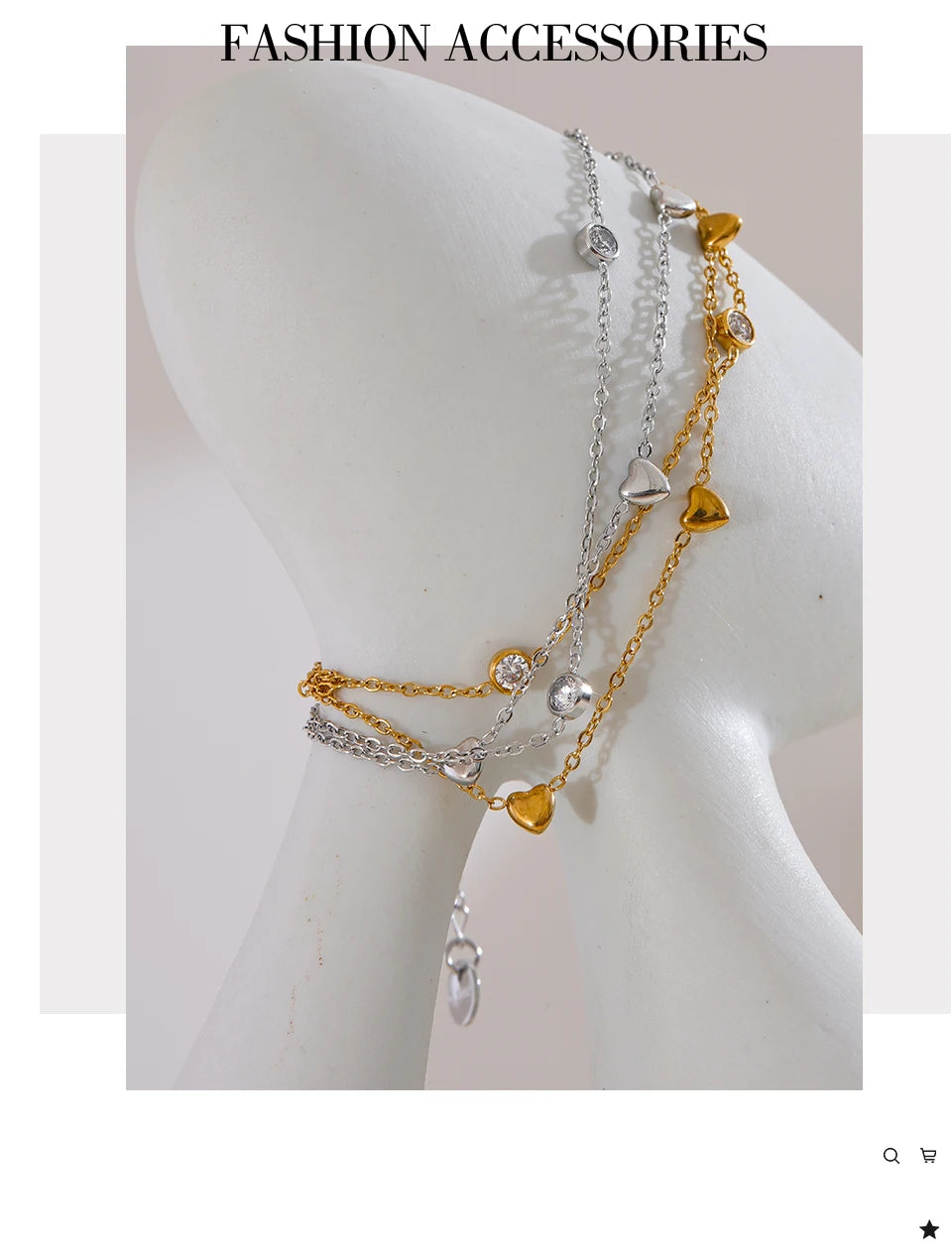 Cubic zirconia heart chain necklace in gold-plated stainless steel with cubic zirconia.