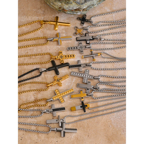 Gold-plated stainless steel cross necklace with multiple chains.