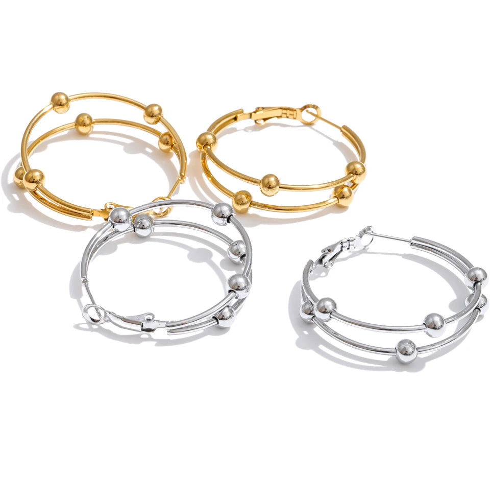 Geometric earrings in gold-plated stainless steel.