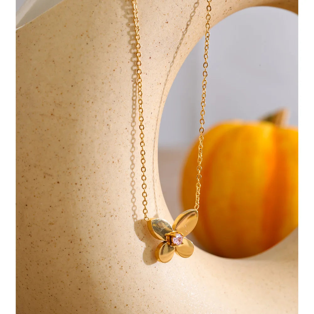 Cubic zirconia butterfly necklace in gold-plated stainless steel with cubic zirconia.