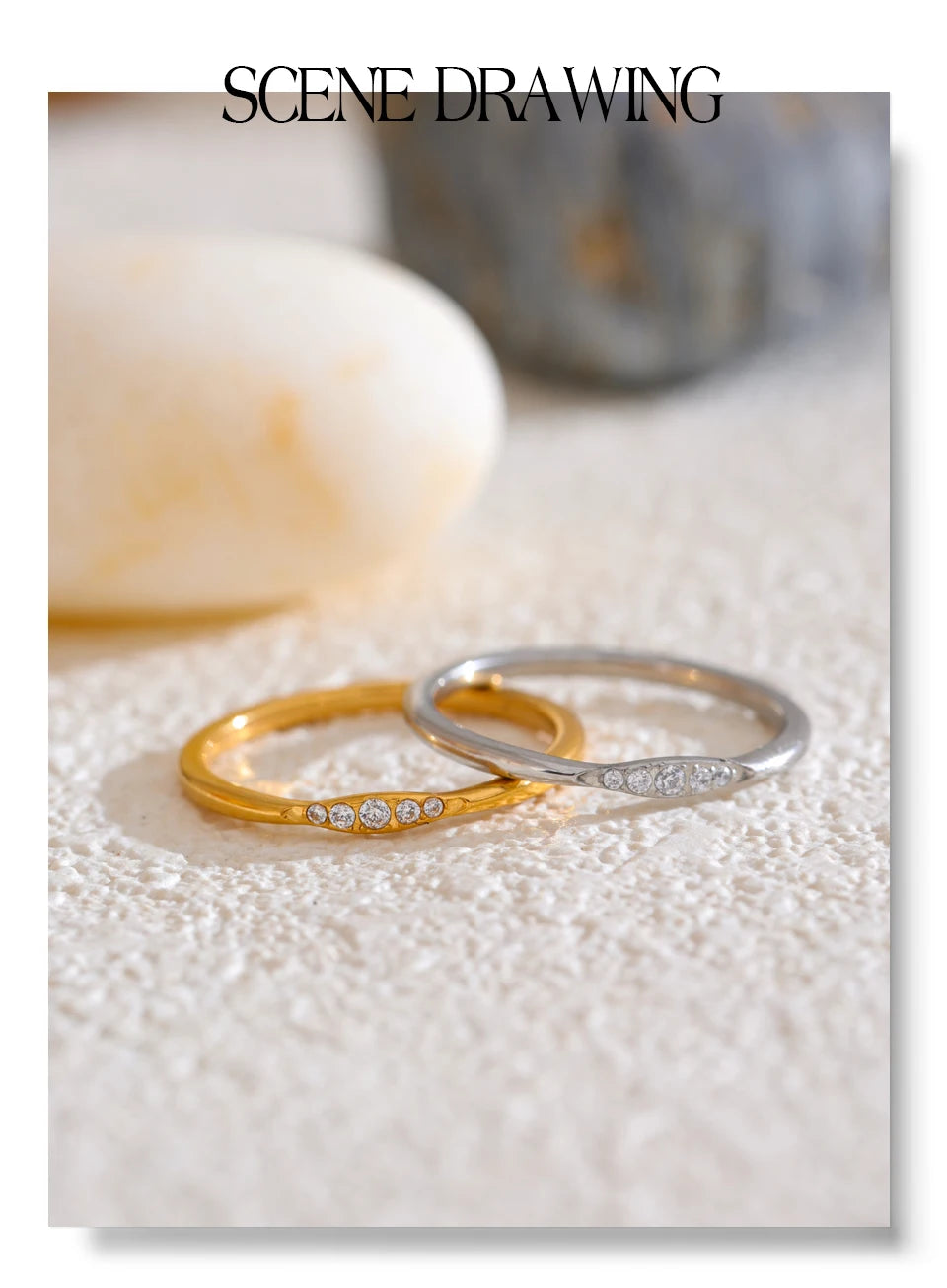 Cubic zirconia geometric ring in 18K gold-plated stainless steel with cubic zirconia.