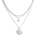 Freshwater pearl sun geometric necklace in gold-plated stainless steel with freshwater pearl.