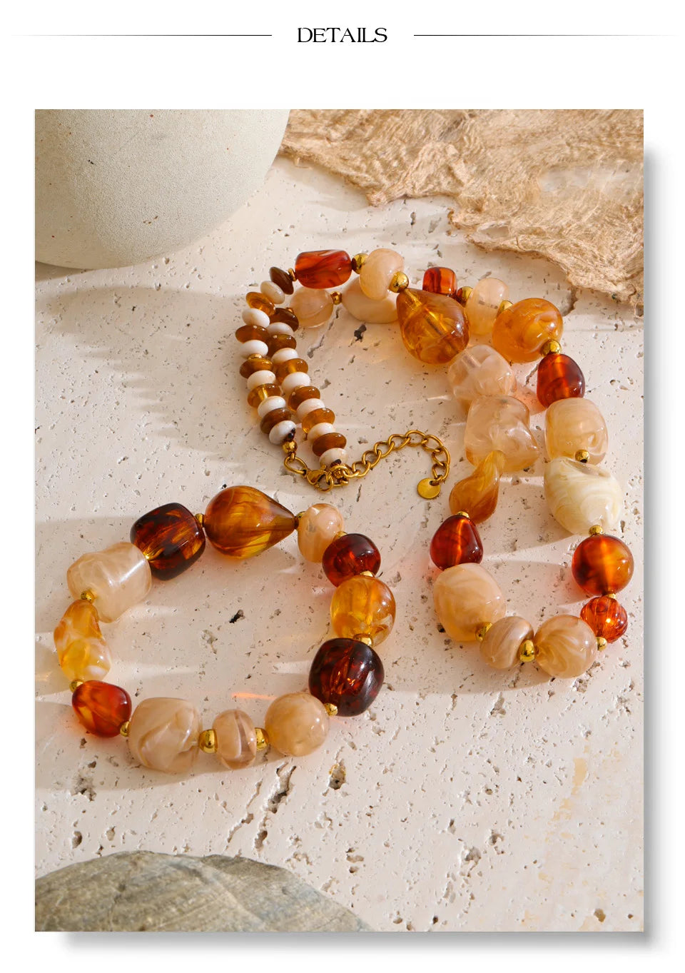 Resin acrylic beaded necklace in gold-plated stainless steel with resin and acrylic.