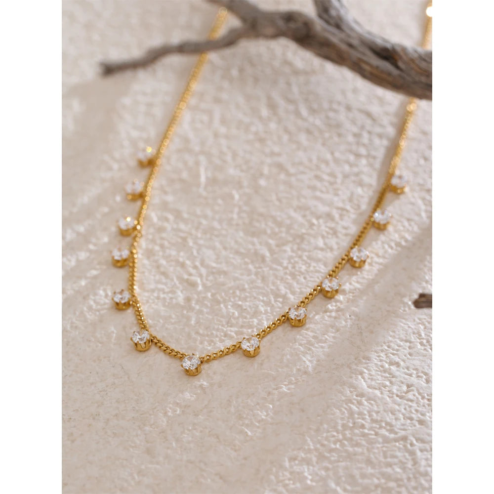 Cubic zirconia geometric chain necklace in gold-plated stainless steel with cubic zirconia.