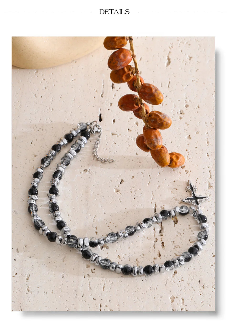 Natural stone cross beaded necklace in gold-plated stainless steel with natural stone.
