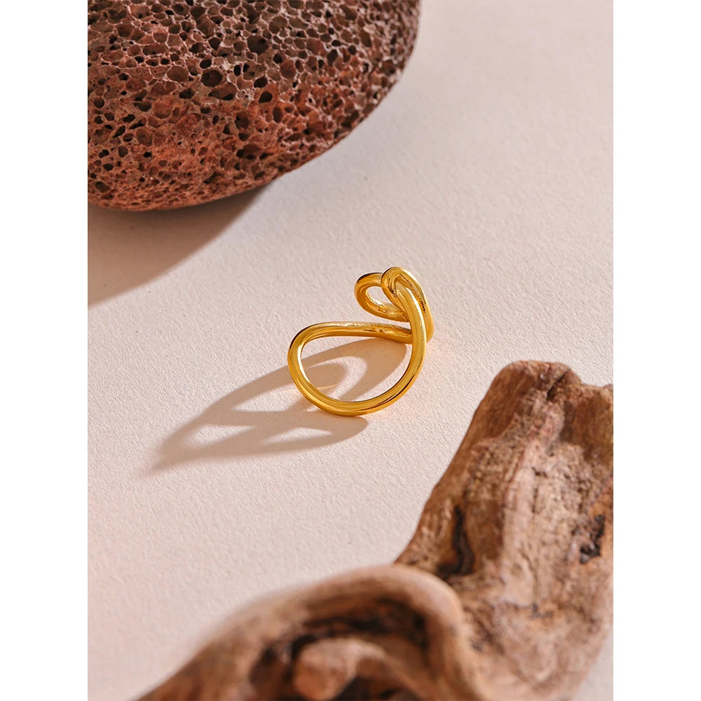 Geometric ring in 18K gold-plated 316L stainless steel.