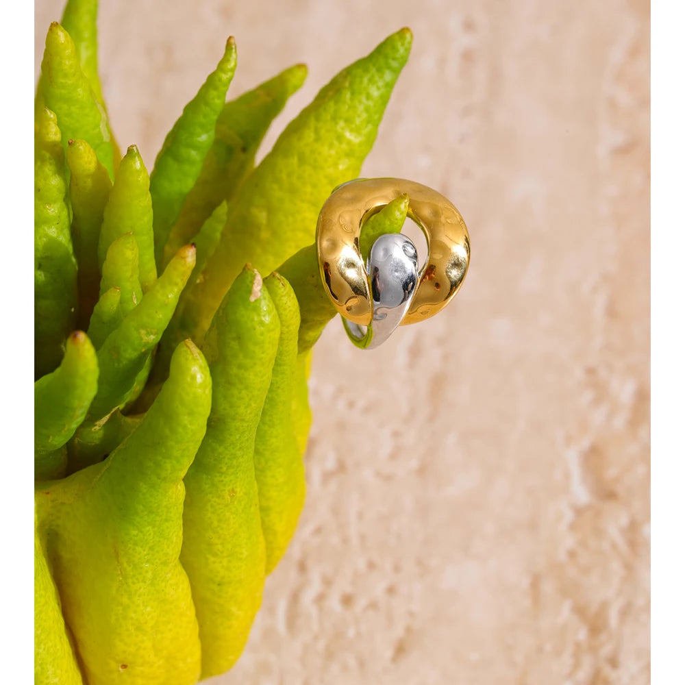 Geometric ring in 18K gold-plated stainless steel.
