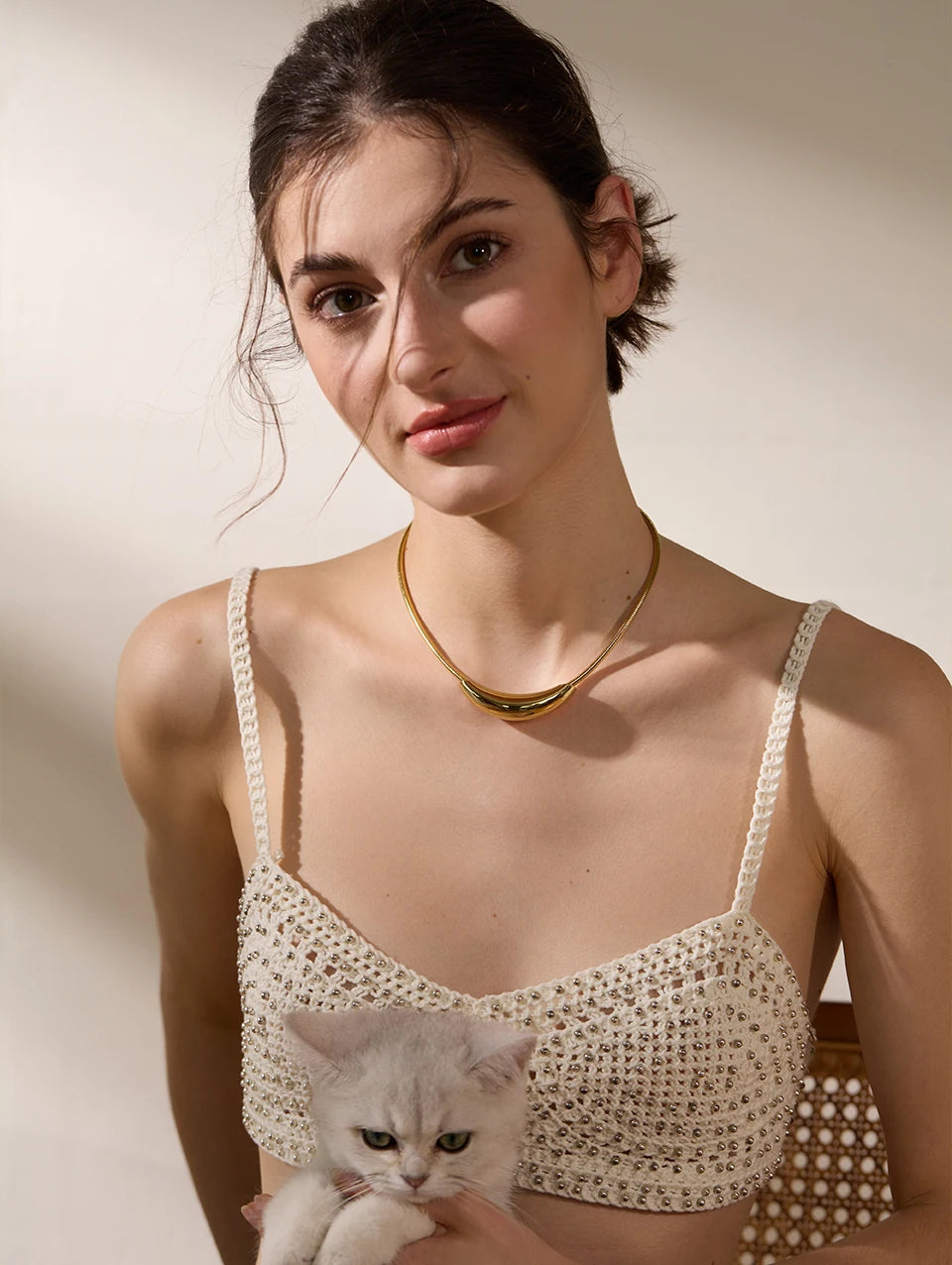 Geometric chain necklace in gold-plated stainless steel.