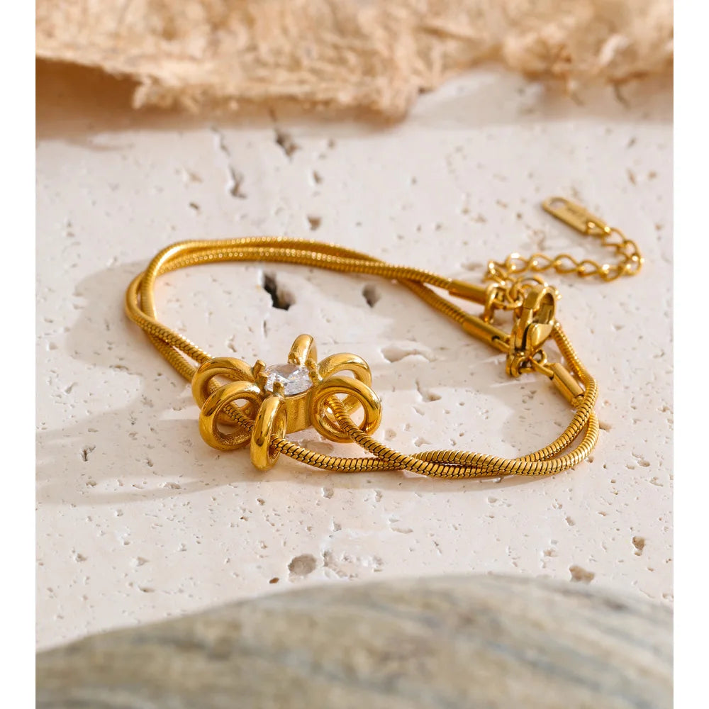 Cubic Zirconia Flower Geometric Bracelet — Gold-Plated Stainless Steel with Cubic Zirconia · PS1406