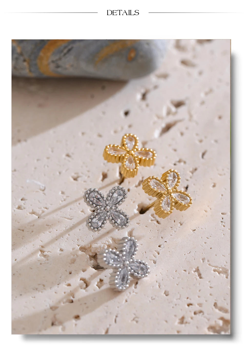 Cubic zirconia flower earrings in gold-plated stainless steel with cubic zirconia.