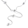 Beaded geometric chain necklace in gold-plated stainless steel.