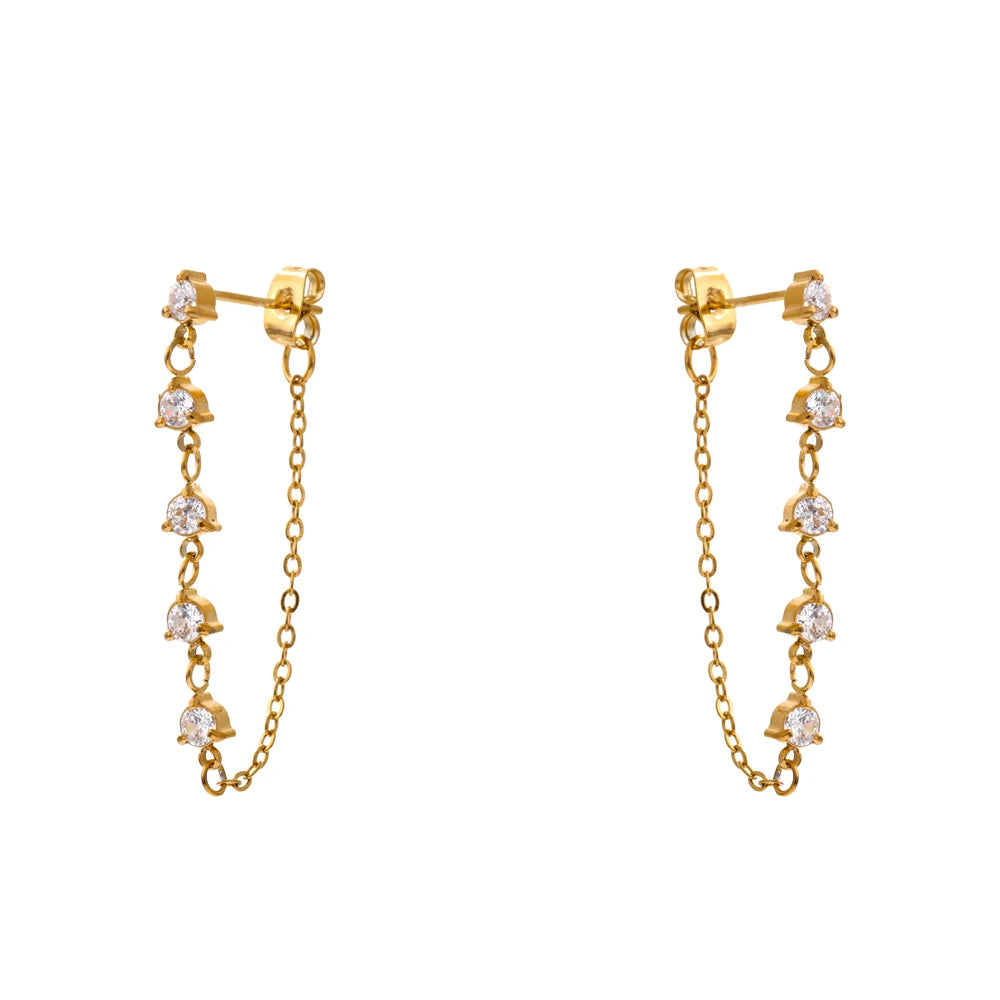 White cubic zirconia geometric earrings in gold-plated stainless steel with cubic zirconia.