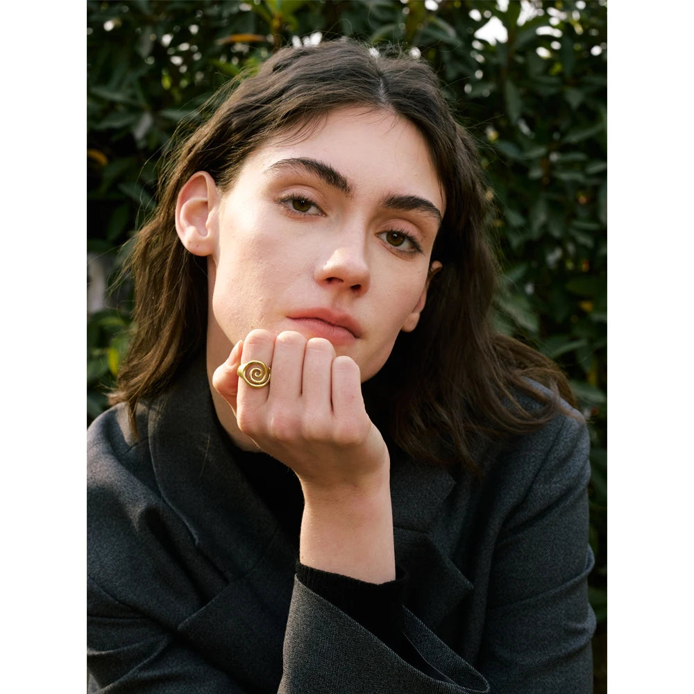 Geometric ring in gold-plated stainless steel.