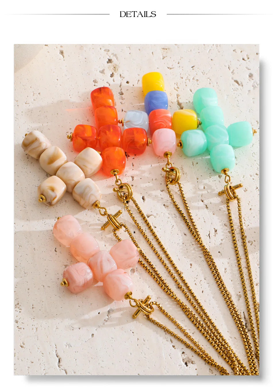 Resin acrylic cross necklace in gold-plated stainless steel with resin and acrylic.