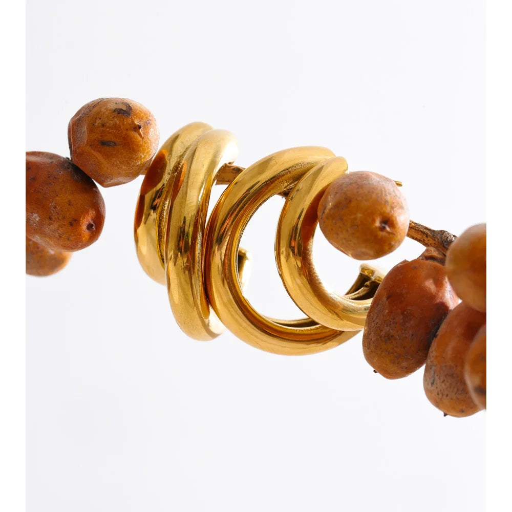 Geometric earrings in gold-plated stainless steel.