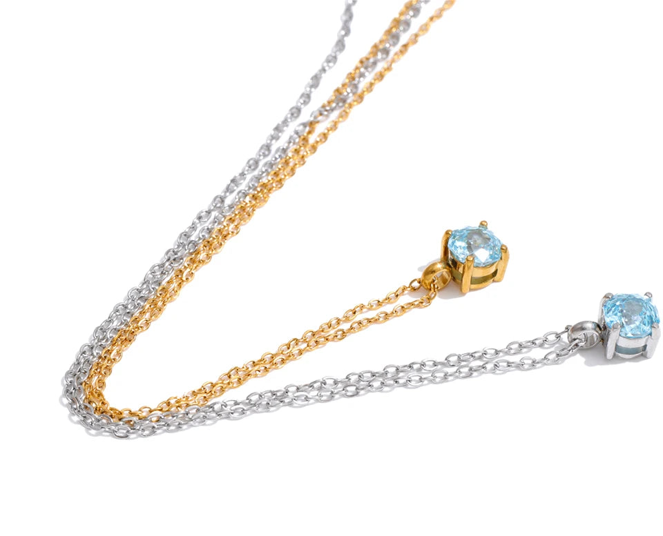Cubic zirconia flower geometric necklace in gold-plated stainless steel with cubic zirconia.