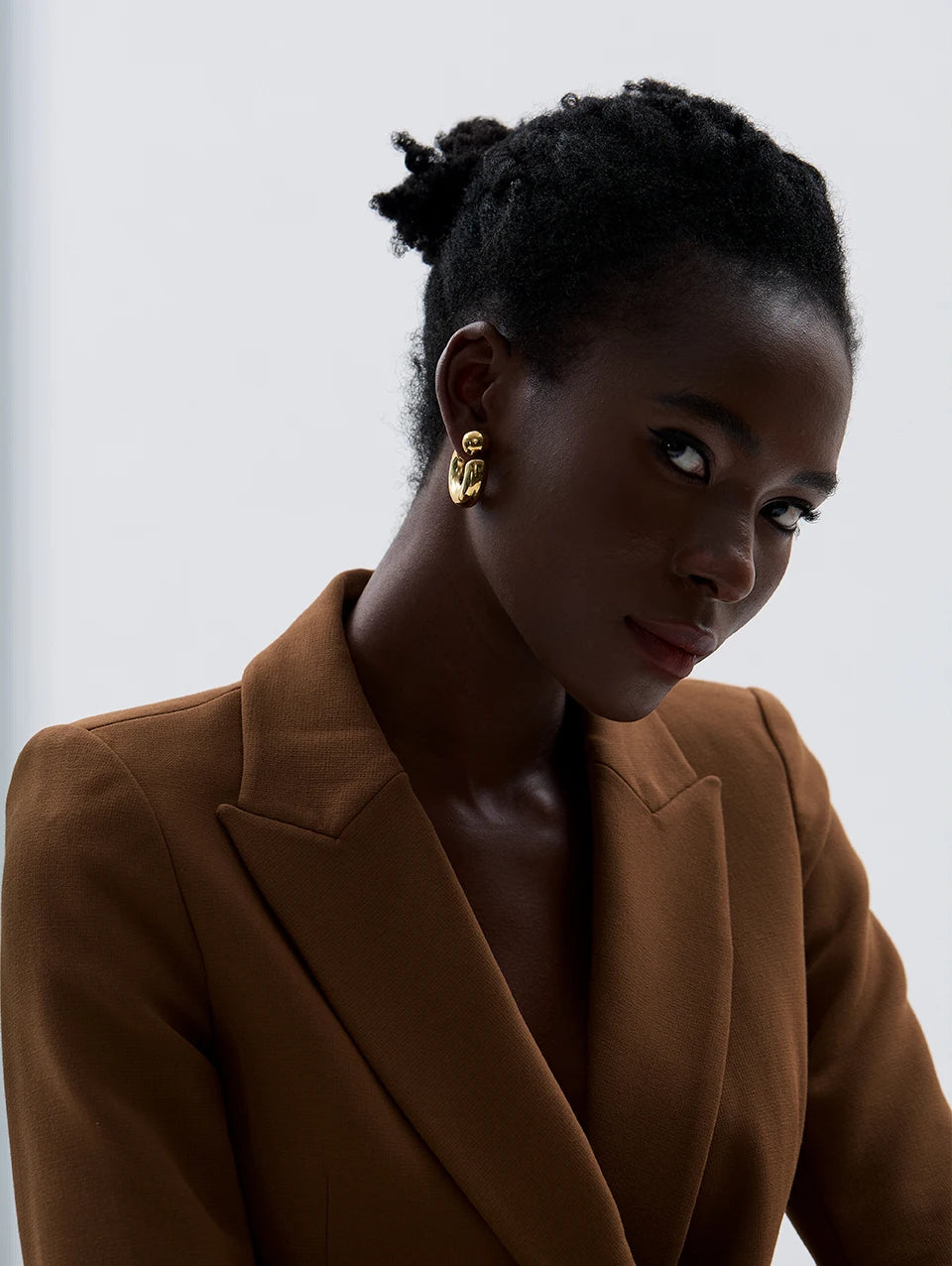 Geometric earrings in gold-plated stainless steel.