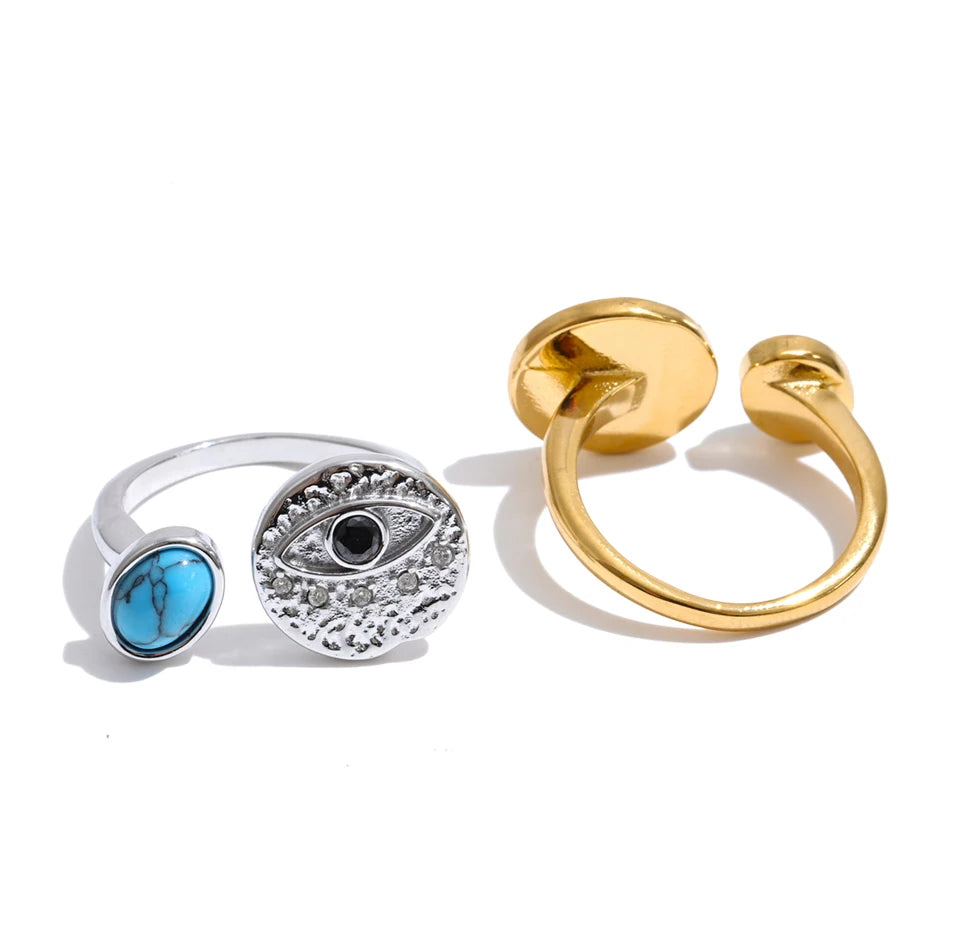 Cubic zirconia natural stone geometric ring in 18K gold-plated stainless steel with cubic zirconia and natural stone.