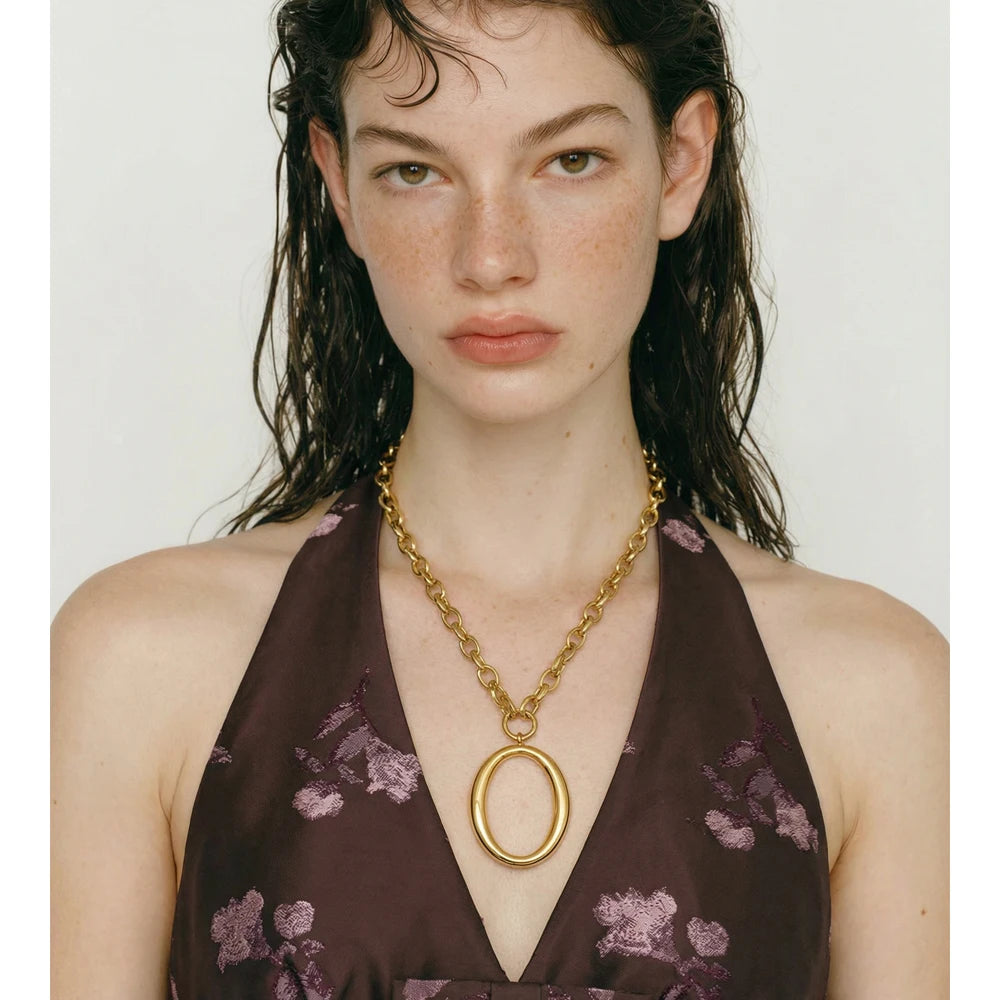 Geometric necklace in gold-plated stainless steel.