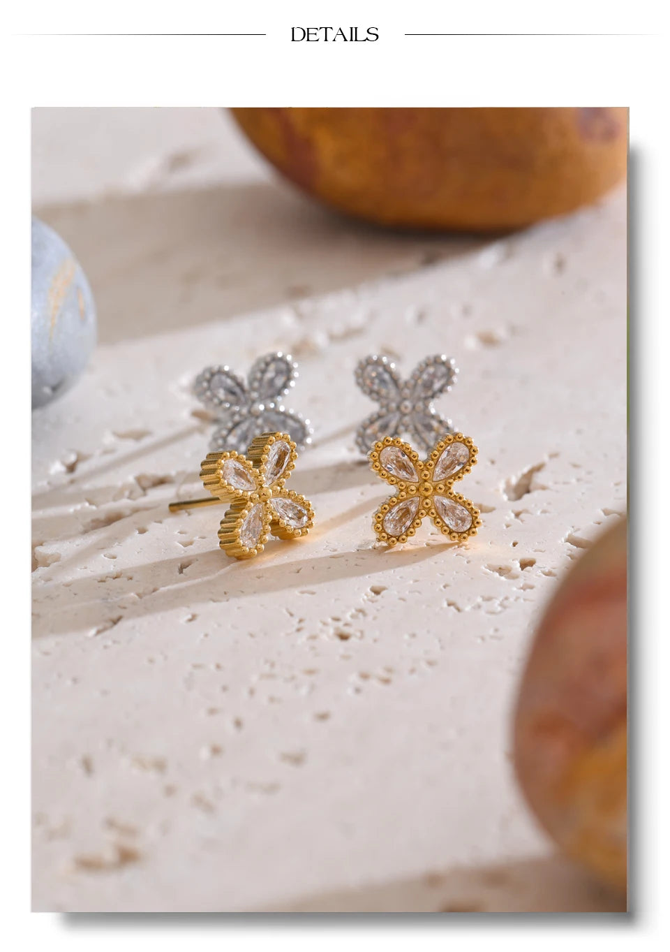 Cubic zirconia flower earrings in gold-plated stainless steel with cubic zirconia.