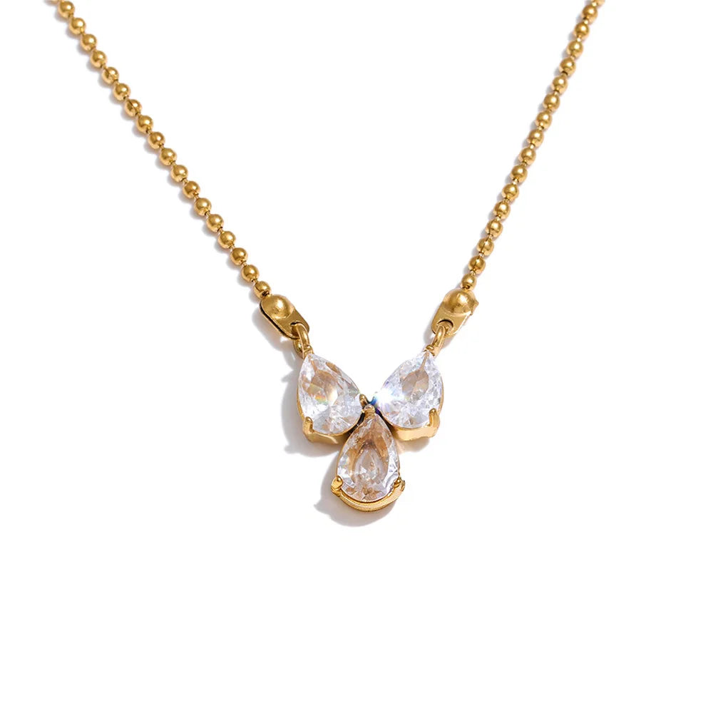 Cubic zirconia geometric necklace in gold-plated stainless steel with cubic zirconia.