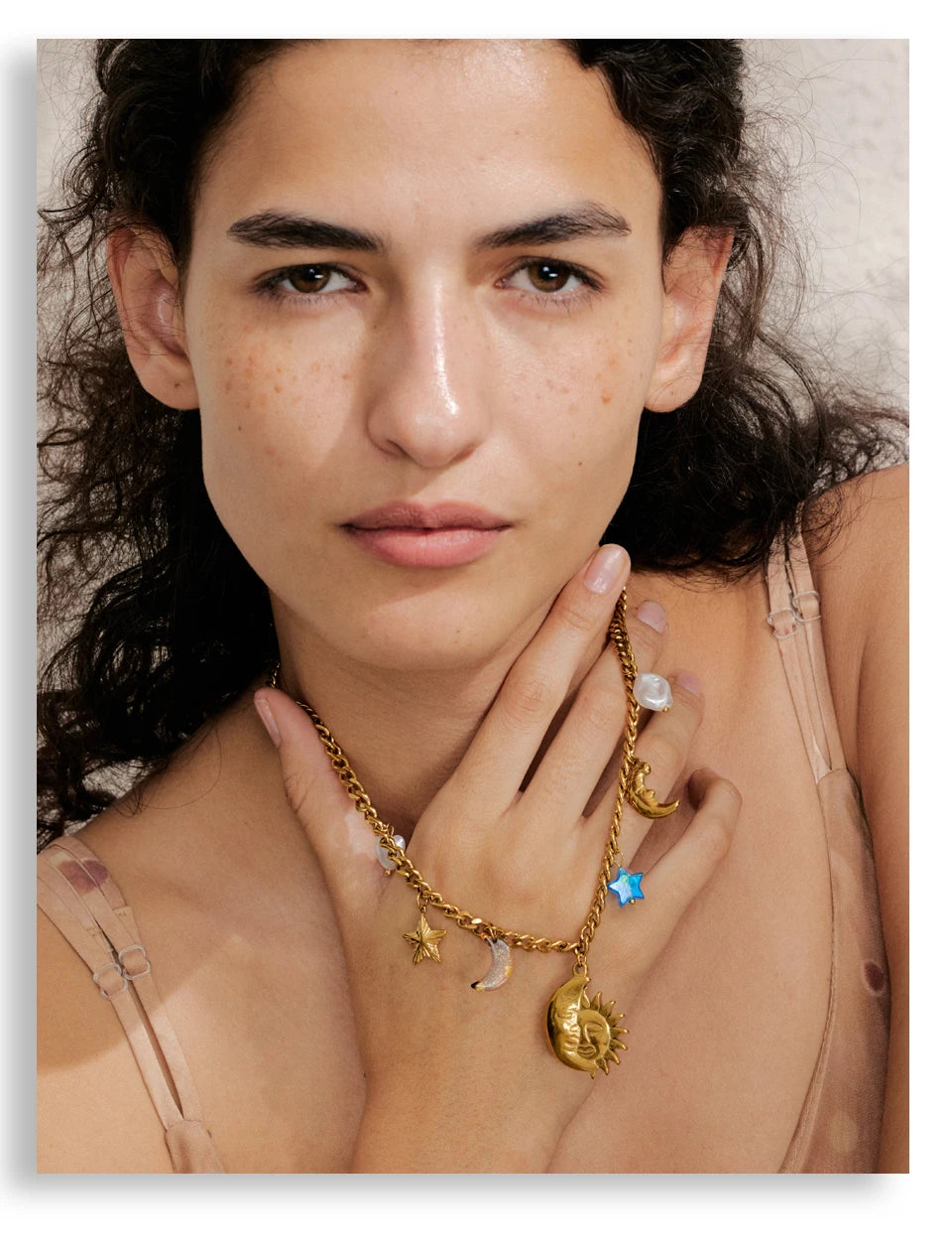 Sun geometric necklace in gold-plated stainless steel.