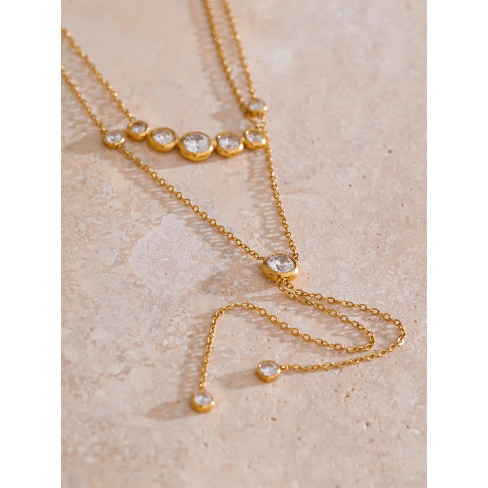 Cubic zirconia geometric chain necklace in gold-plated stainless steel with cubic zirconia.